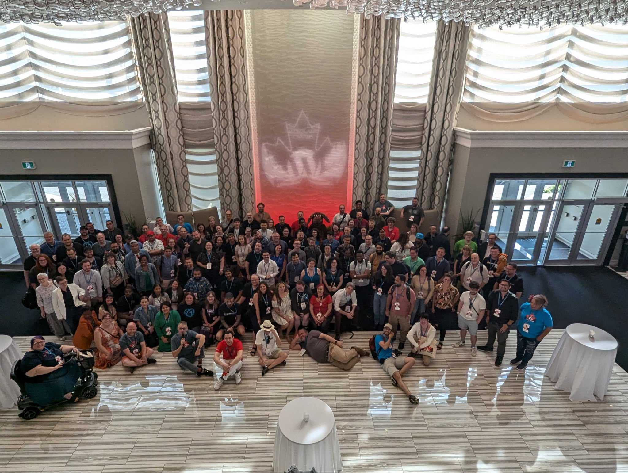 An aerial shot looking down at a large group shot of all the attendees at WordCamp Canada 2024